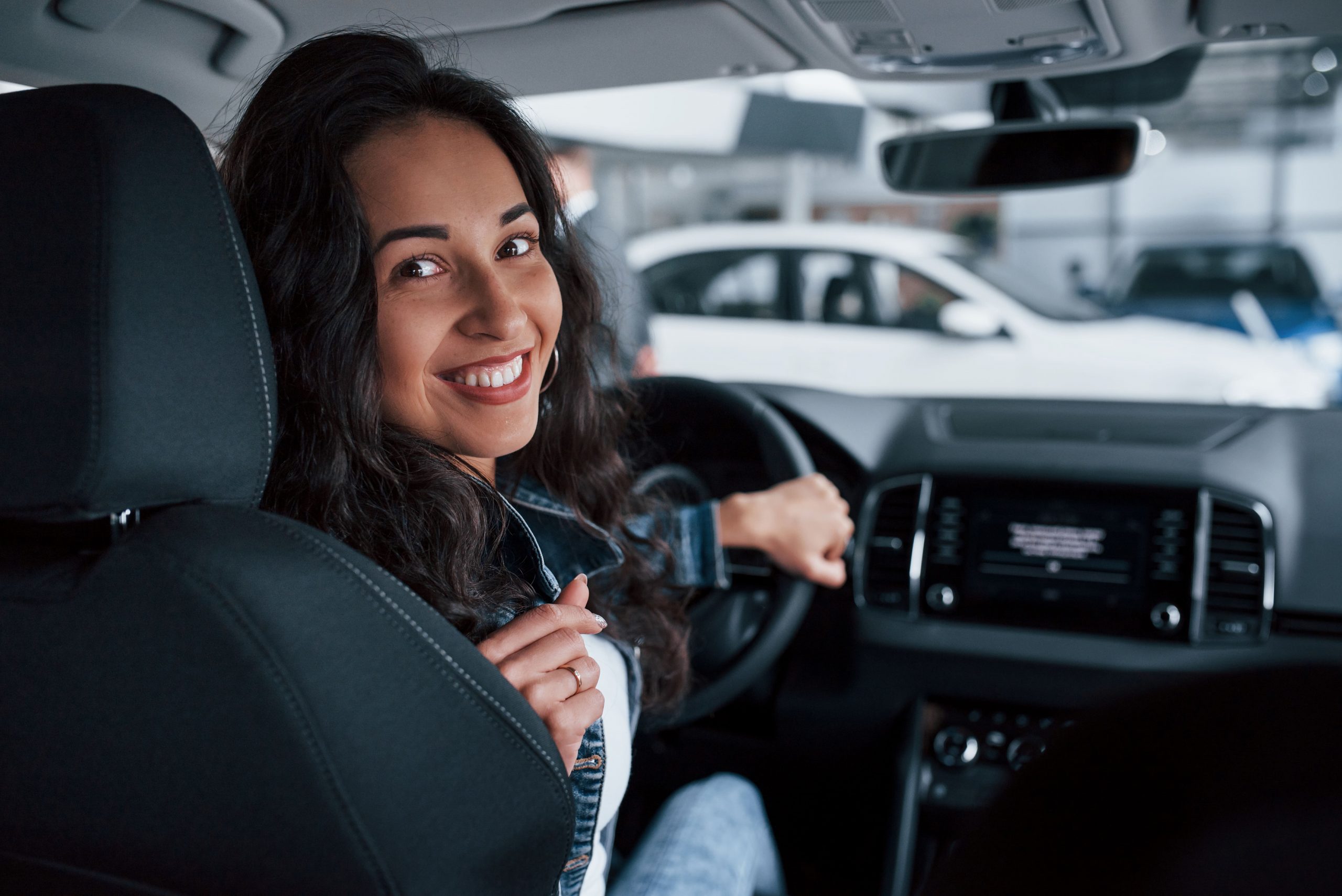 Driving pictures. Human Driver. A girl with a guy at an expensive car.